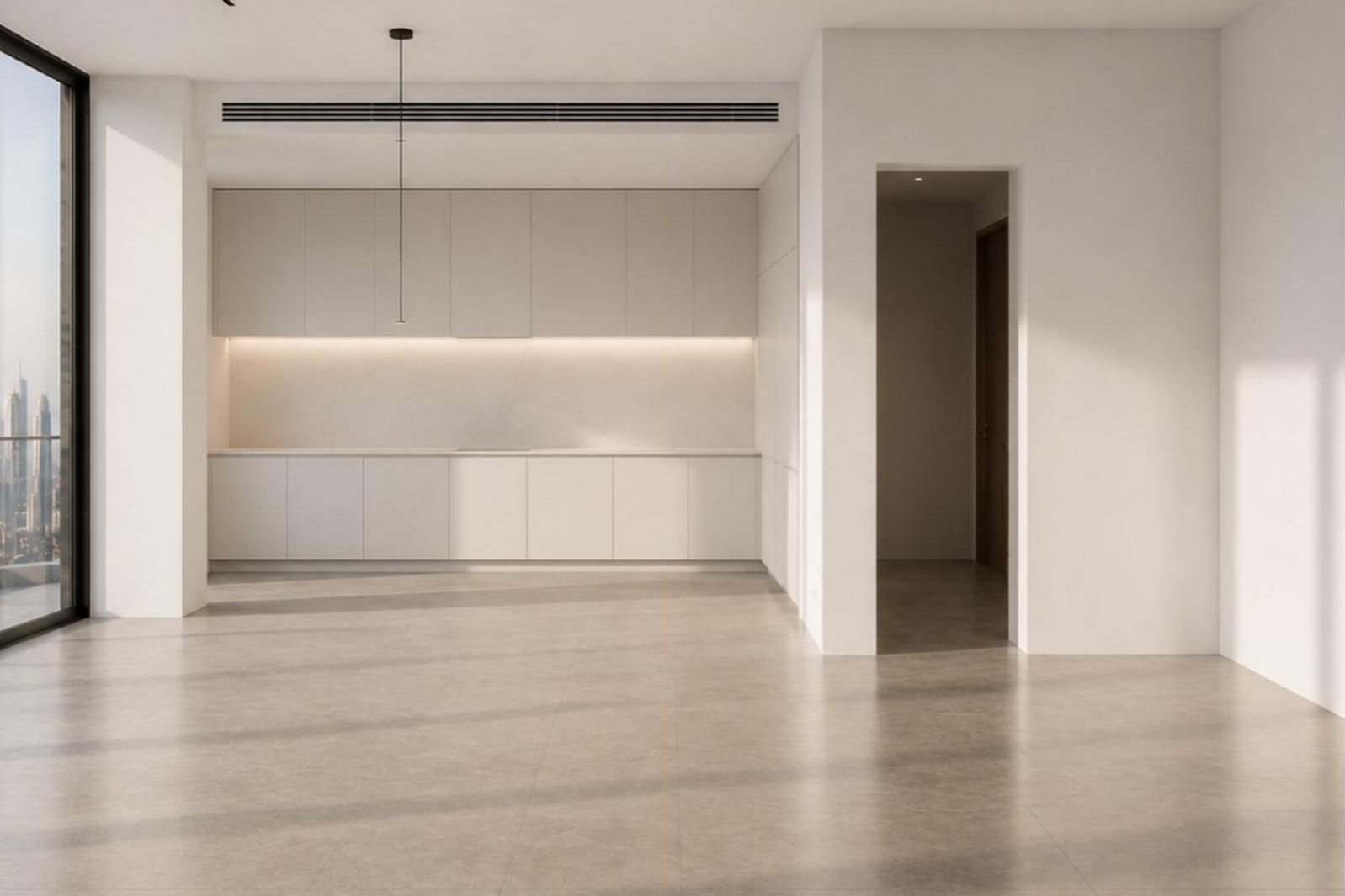 The same living area at handover: empty, with white walls and a bare floor