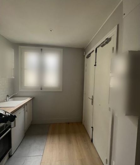 The kitchen and window before, with no counter